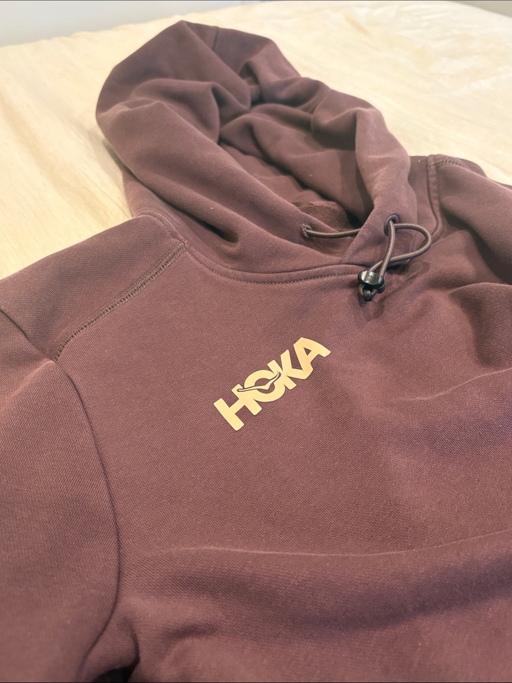 Hooks Deep Plum with Cream Right Chest Logo. Size Medium with thumb holes
